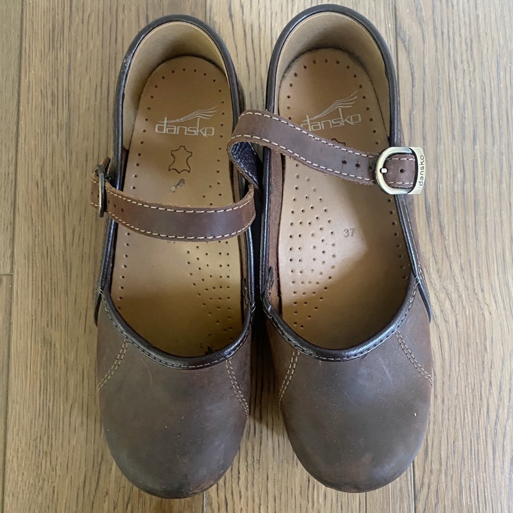 Dansko Mary Jane brown leather clogs.